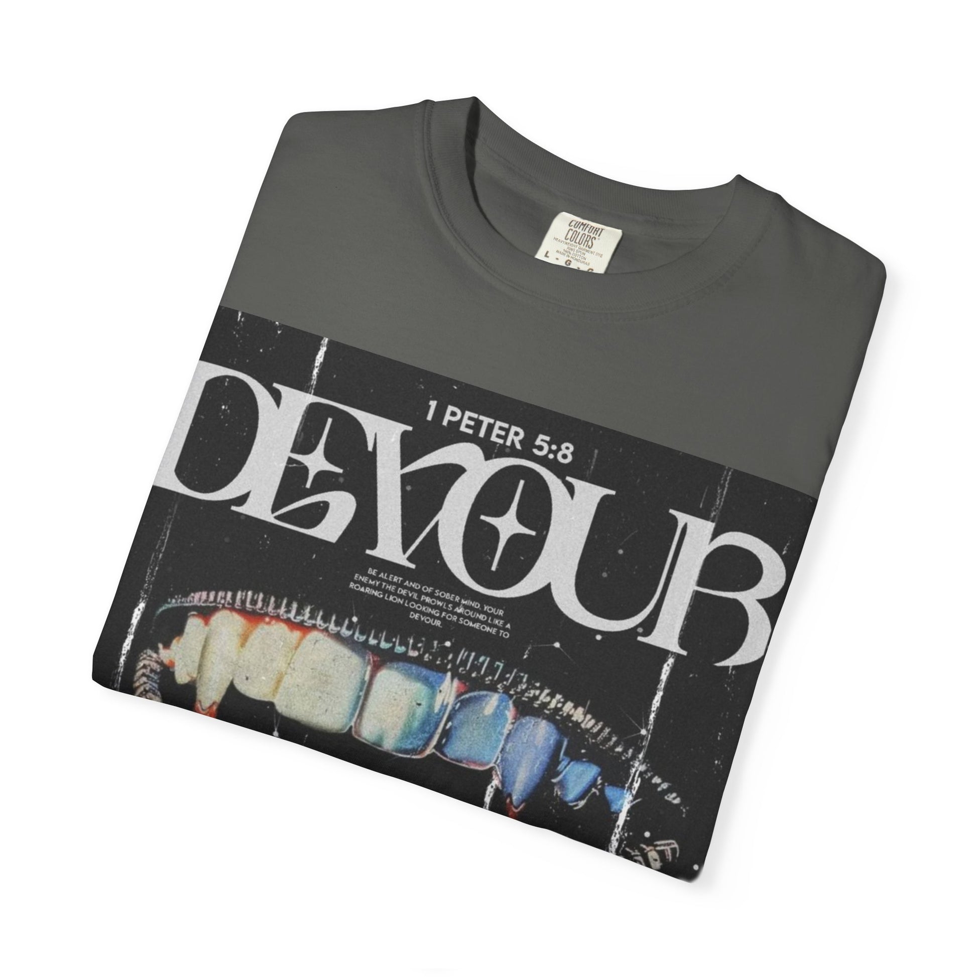 Folded DarkThoughts ‘Devour’ pepper graphic t-shirt with distorted teeth and tongue collage and grunge lettering — gothic alternative streetwear.