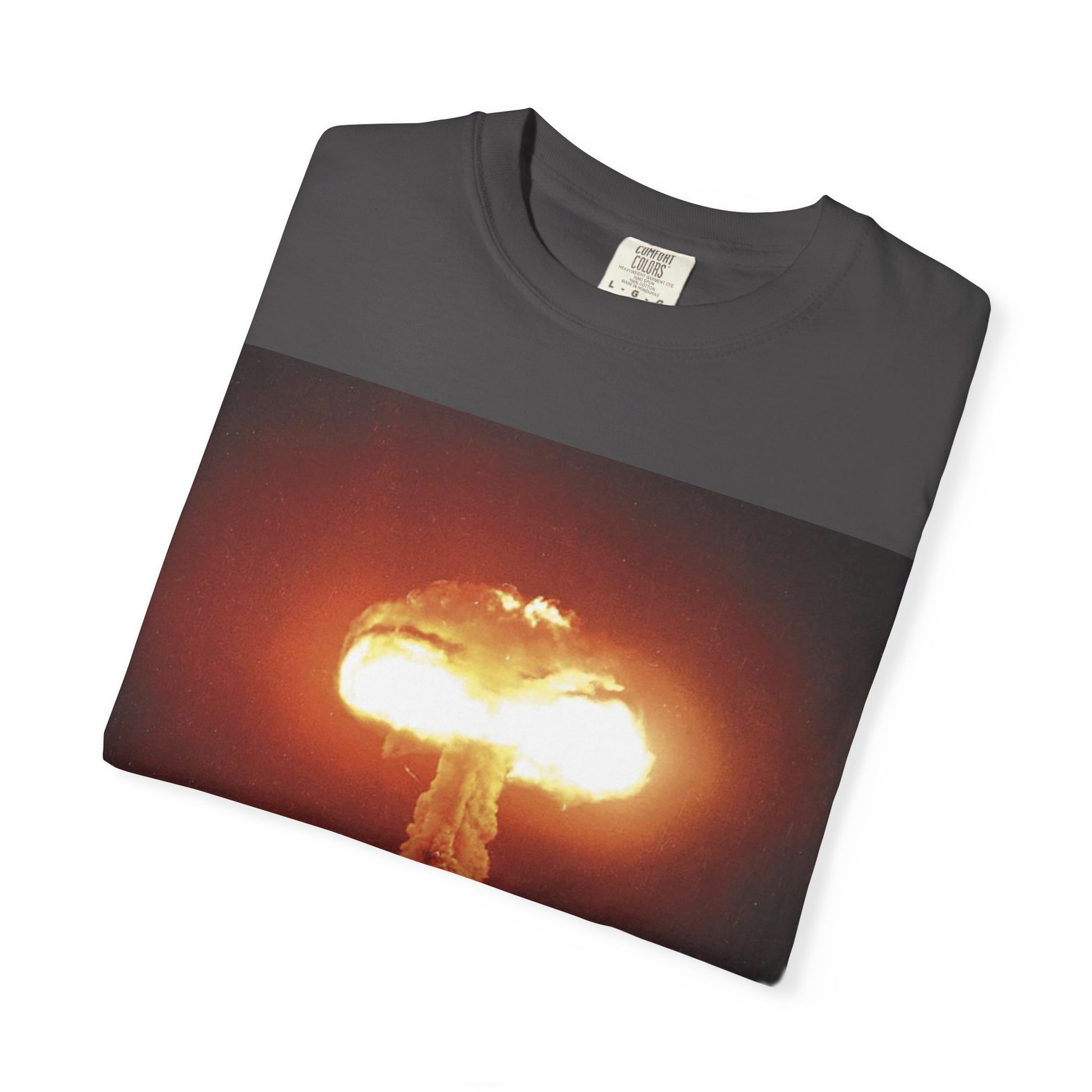 DarkThoughts ‘End of Broadcast’ graphite graphic t-shirt featuring a silhouette figure watching a massive explosion in vivid orange tones — dark grunge alternative streetwear tee.
