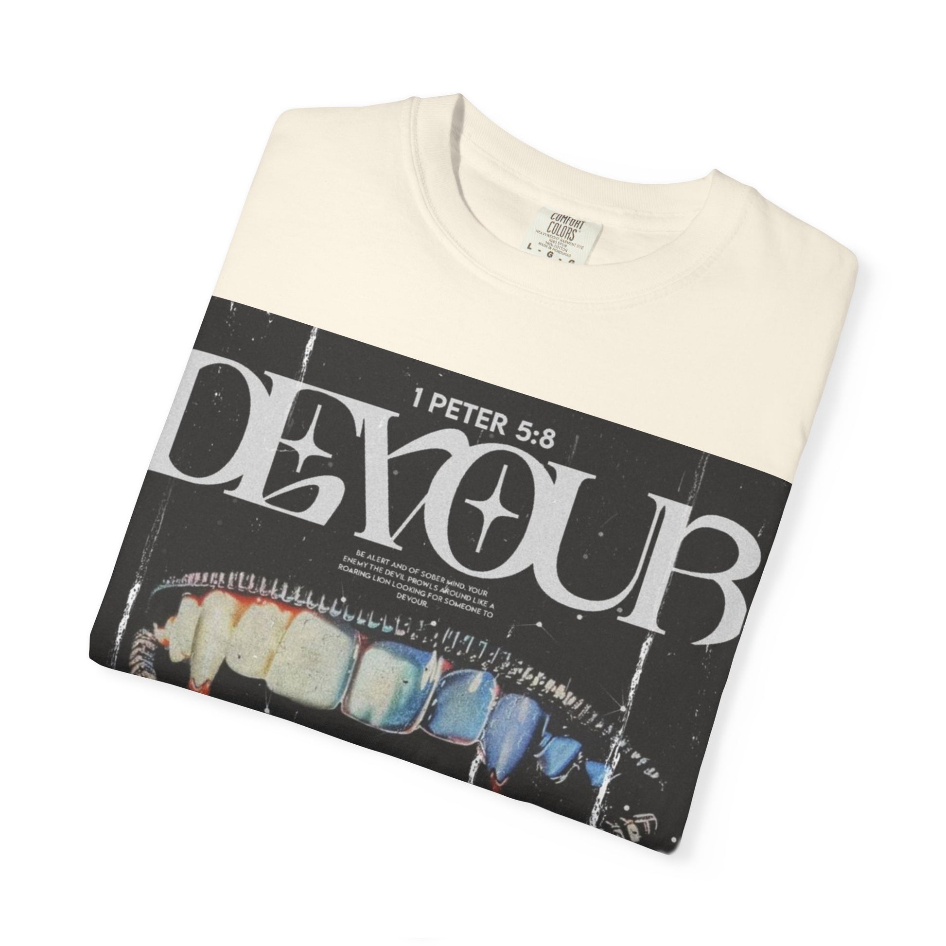 Folded DarkThoughts ‘Devour’ ivory graphic t-shirt with distorted teeth and tongue collage and grunge lettering — gothic alternative streetwear.