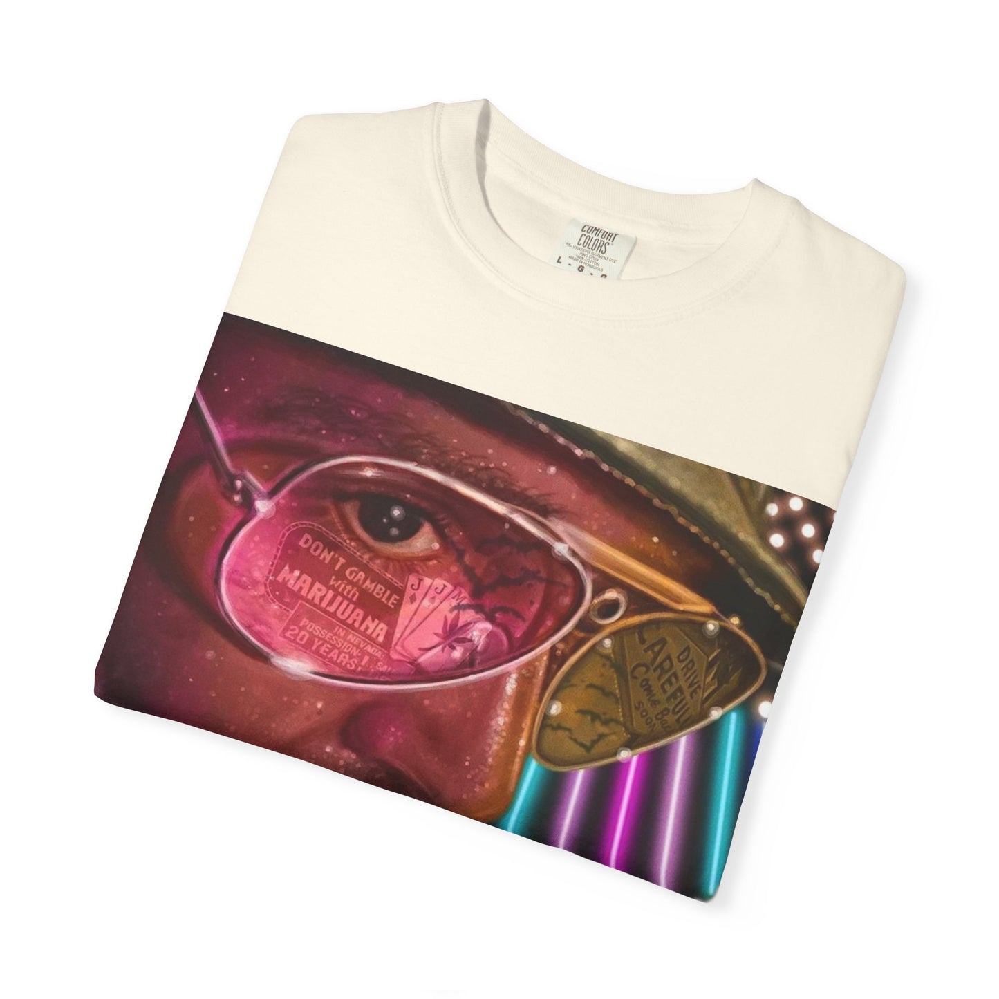 Folded DarkThoughts ‘Fear and Loathing’ ivory graphic t-shirt featuring psychedelic neon artwork with surreal sunglasses and desert visuals — bold alternative streetwear.