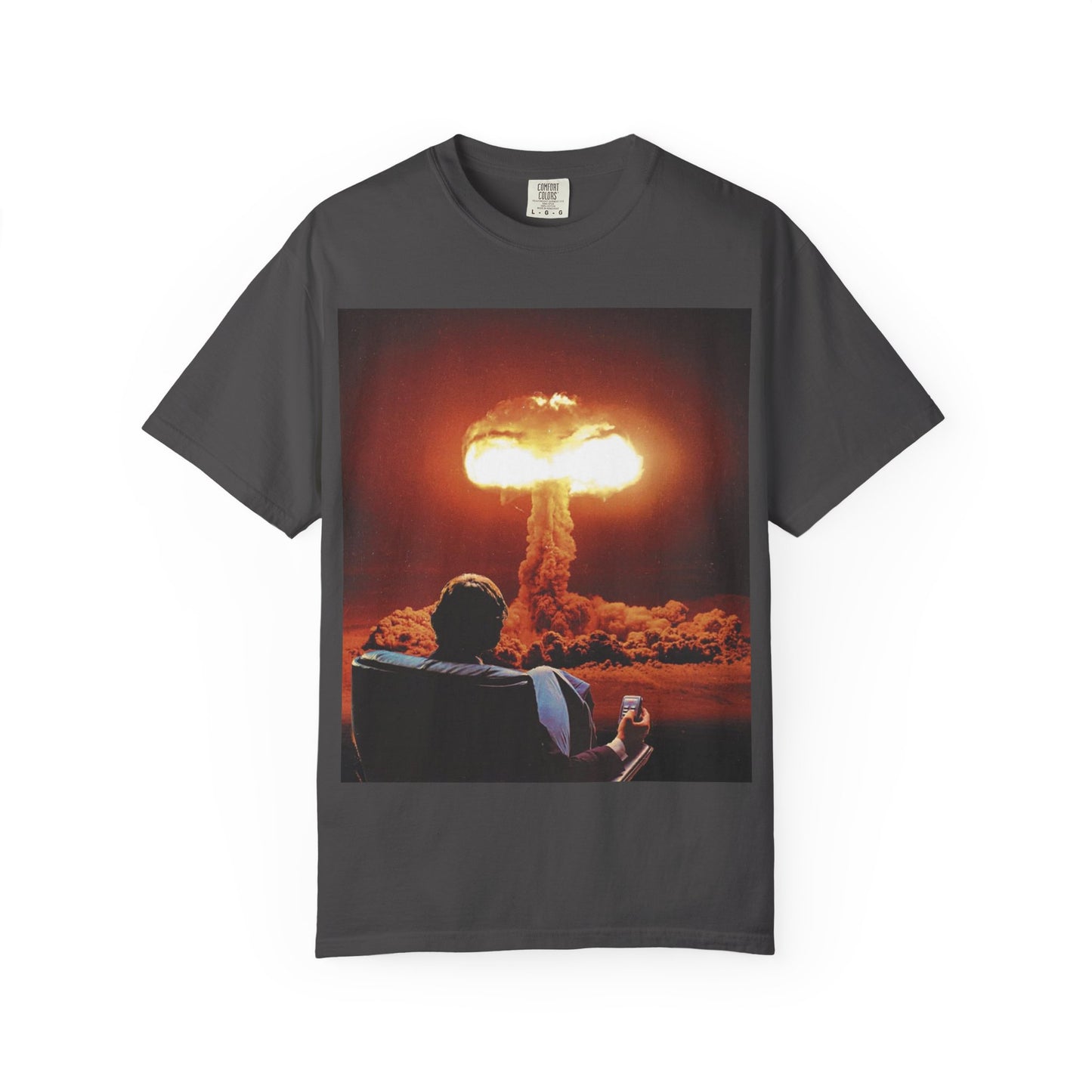 DarkThoughts ‘End of Broadcast’ graphite graphic t-shirt featuring a silhouette figure watching a massive explosion in vivid orange tones — dark grunge alternative streetwear tee.